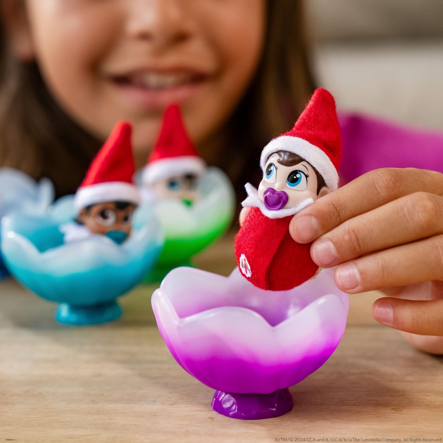 The Elf on the Shelf Frost Pips Mini Blooms Elf Baby Girl with Blue Eyes - Includes Frost Flower Cradle - for Ages 3 Years and Above